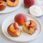 Peach upside down mini cakes on rustic plate