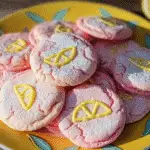 pink lemonade cookies on white plate