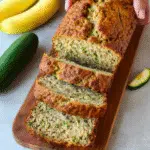 zucchini banana bread sliced loaf on kitchen counter