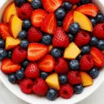 Peach Berry Fruit Salad in bowl