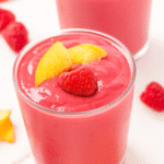 raspberry peach smoothie in a glass